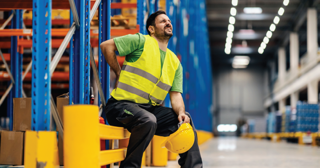 Warehouse employee with severe back pain