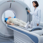 Patient undergoing an abdominal CT scan, lying on a scanning table as the machine captures images of internal organs for diagnosis.