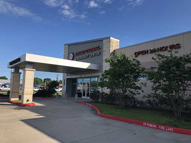 A building labeled "Exceptional Emergency Center" with a modern design and a visible entrance.