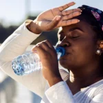 Dehydration causes headaches during outdoor heat exposure.